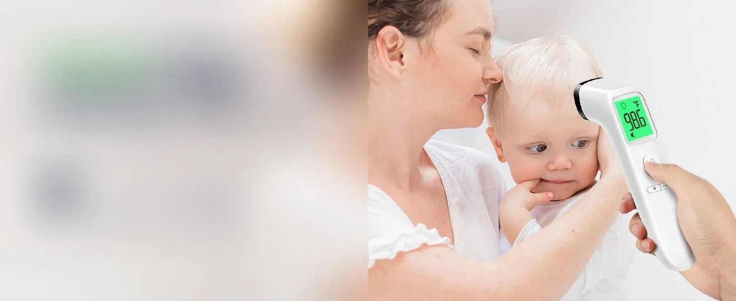 Parent checking a baby’s temperature with a Viproud no-touch thermometer